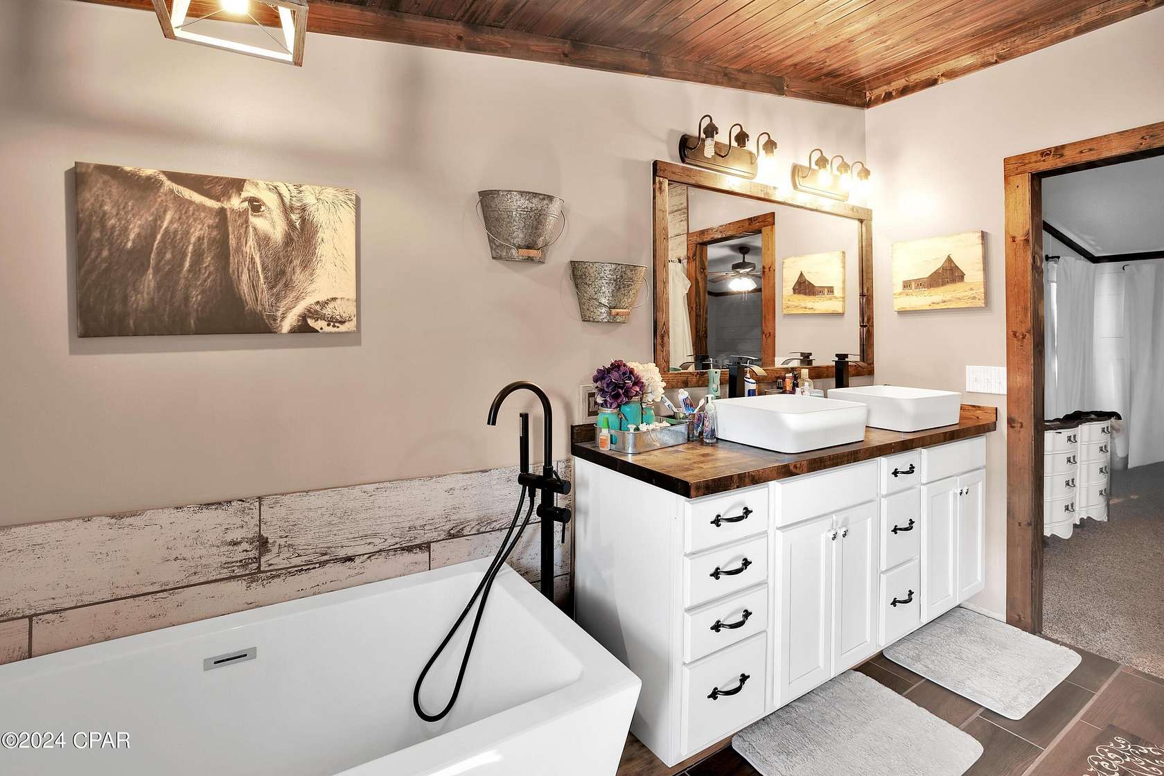 10 Acres of Residential Land with Home for Sale in Fountain, Florida