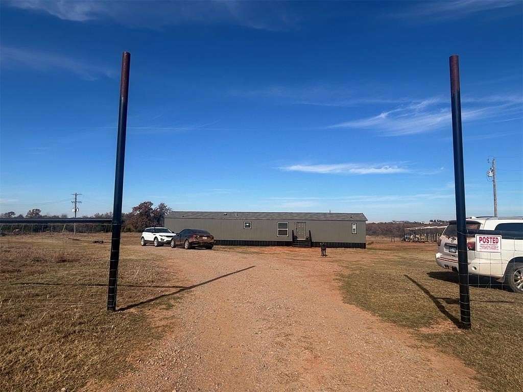 12.7 Acres of Land with Home for Sale in Carney, Oklahoma