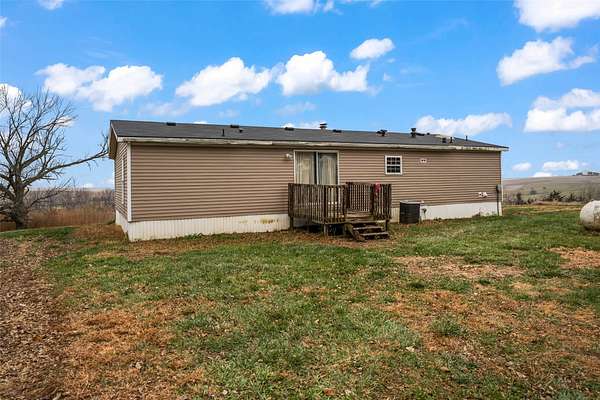 5.64 Acres of Residential Land with Home for Sale in Reasnor, Iowa