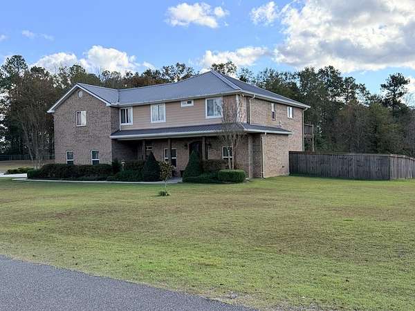 1.7 Acres of Residential Land with Home for Sale in Poplarville, Mississippi