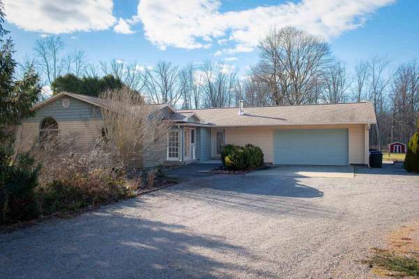 17 Acres of Land with Home for Sale in Midland, Michigan