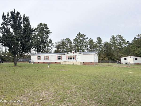 2.5 Acres of Residential Land with Home for Sale in Tar Heel, North Carolina