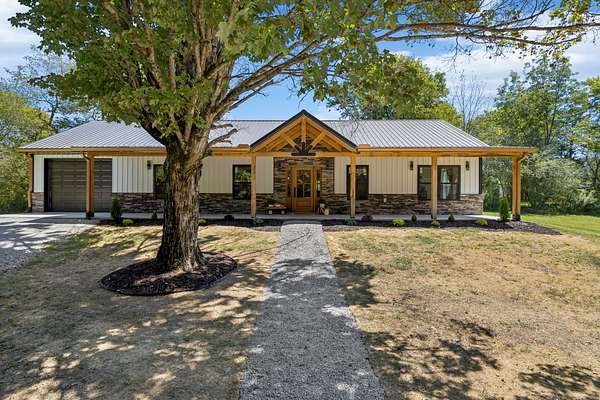 1.54 Acres of Residential Land with Home for Sale in Hohenwald, Tennessee