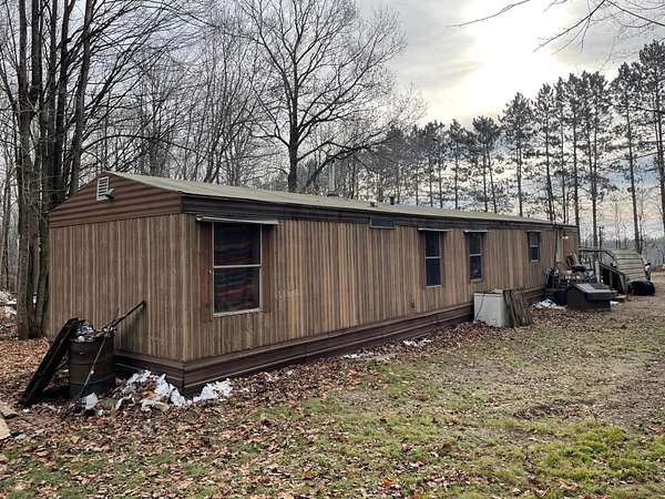 9 Acres of Residential Land with Home for Sale in Butternut, Wisconsin