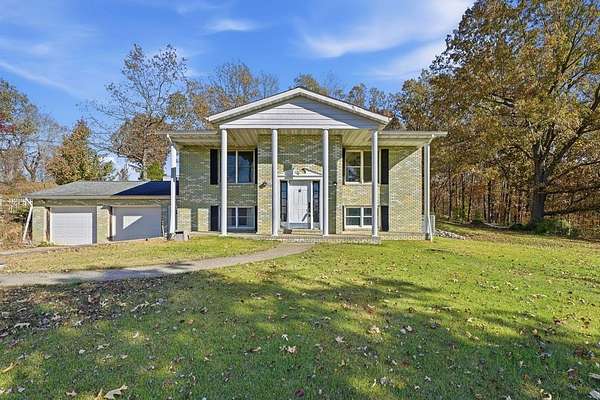 2.75 Acres of Residential Land with Home for Sale in Nortonville, Kentucky