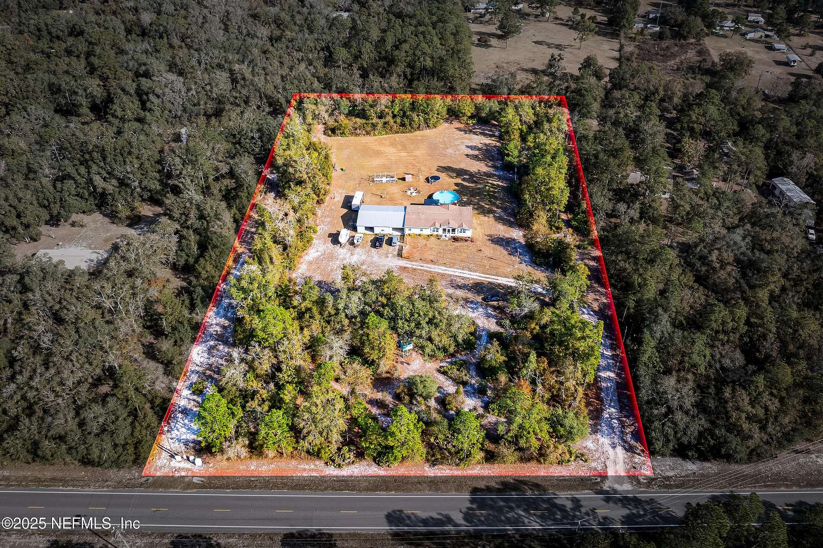 5.2 Acres of Residential Land with Home for Sale in Keystone Heights, Florida