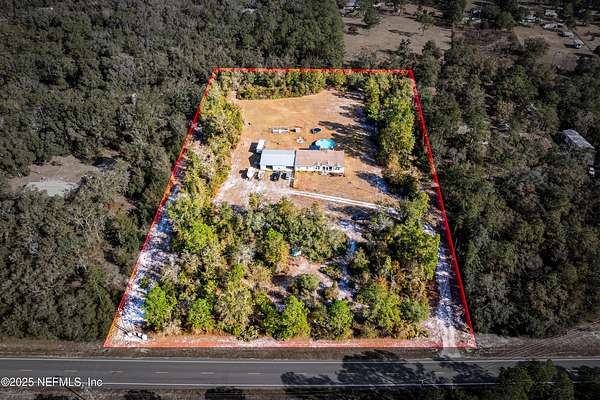 5.2 Acres of Residential Land with Home for Sale in Keystone Heights, Florida