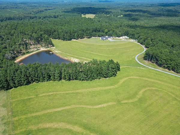 70.9 Acres of Land with Home for Sale in Atlanta, Texas