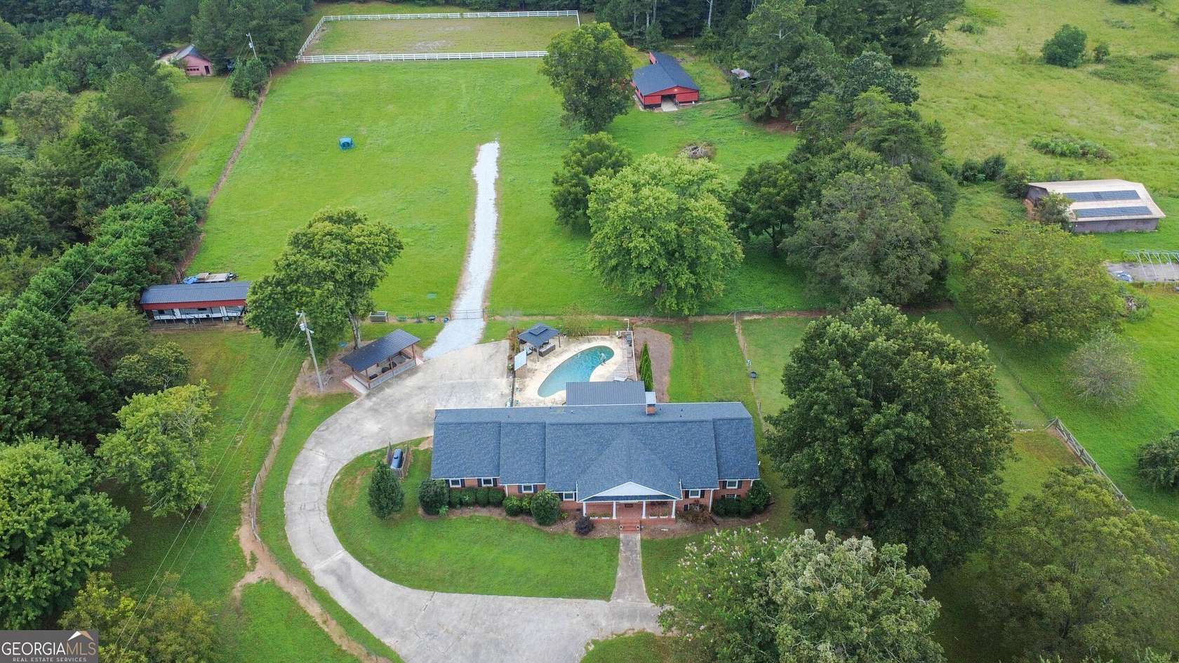 7.19 Acres of Land with Home for Sale in Loganville, Georgia