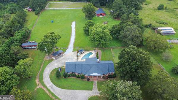 7.19 Acres of Land with Home for Sale in Loganville, Georgia