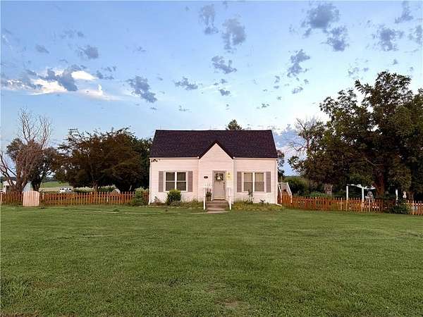 9.3 Acres of Land with Home for Sale in Holden, Missouri