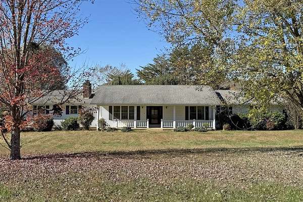 7.35 Acres of Land with Home for Sale in Scottsville, Kentucky