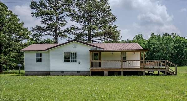 10.9 Acres of Land with Home for Sale in Muse, Oklahoma