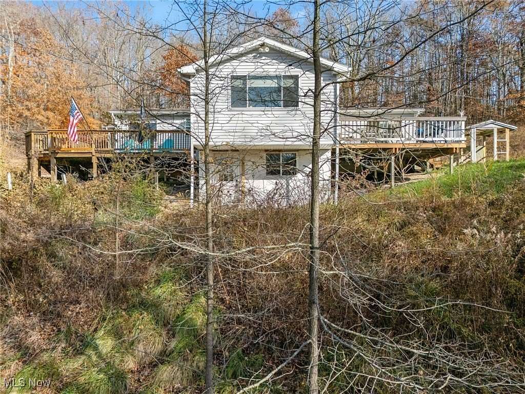 5.5 Acres of Land with Home for Sale in Uhrichsville, Ohio