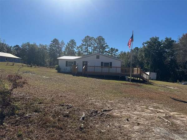 2.13 Acres of Residential Land with Home for Sale in Hilliard, Florida