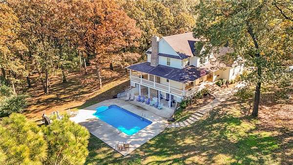 11.7 Acres of Land with Home for Sale in Belleville, Arkansas