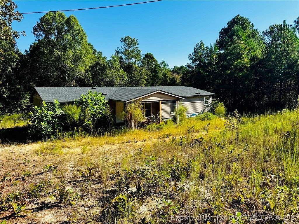 1.69 Acres of Residential Land with Home for Sale in Cameron, North Carolina