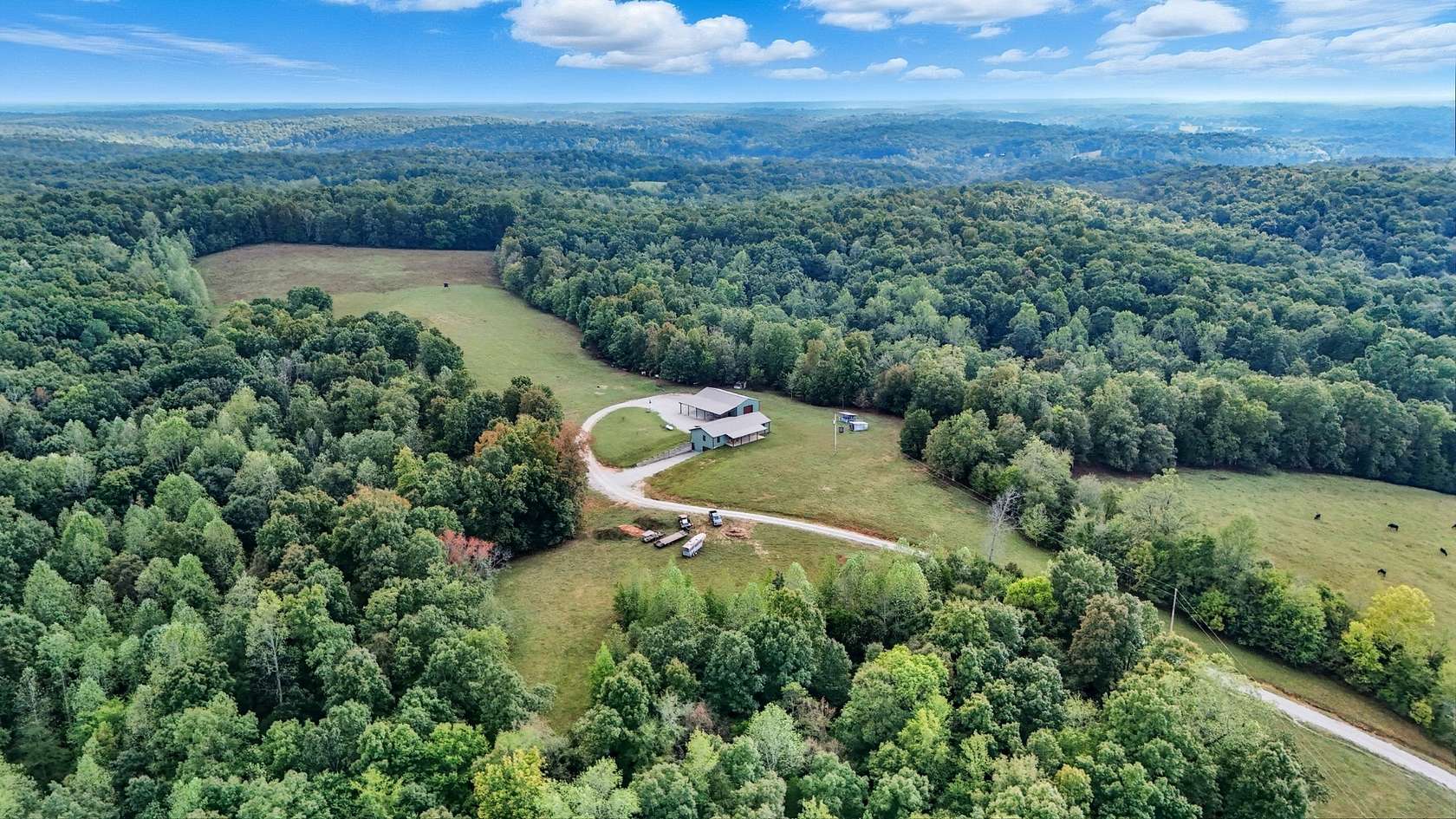 60 Acres of Land with Home for Sale in McEwen, Tennessee