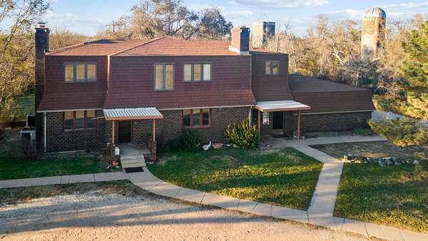 9 Acres of Residential Land with Home for Auction in Hutchinson, Kansas