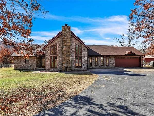 15.3 Acres of Land with Home for Sale in Pocola, Oklahoma