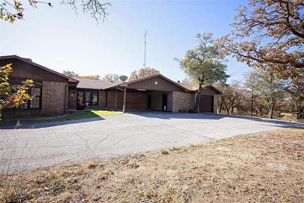 6.15 Acres of Residential Land with Home for Sale in Graham, Texas