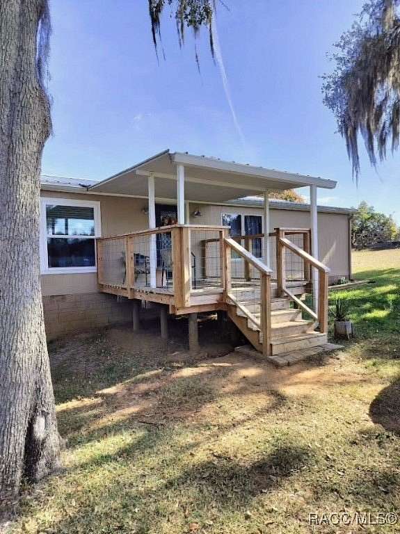 2.4 Acres of Residential Land with Home for Sale in Floral City, Florida