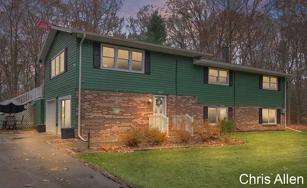 3 Acres of Residential Land with Home for Sale in Rockford, Michigan