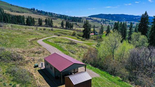 240 Acres of Recreational Land with Home for Sale in Kettle Falls, Washington