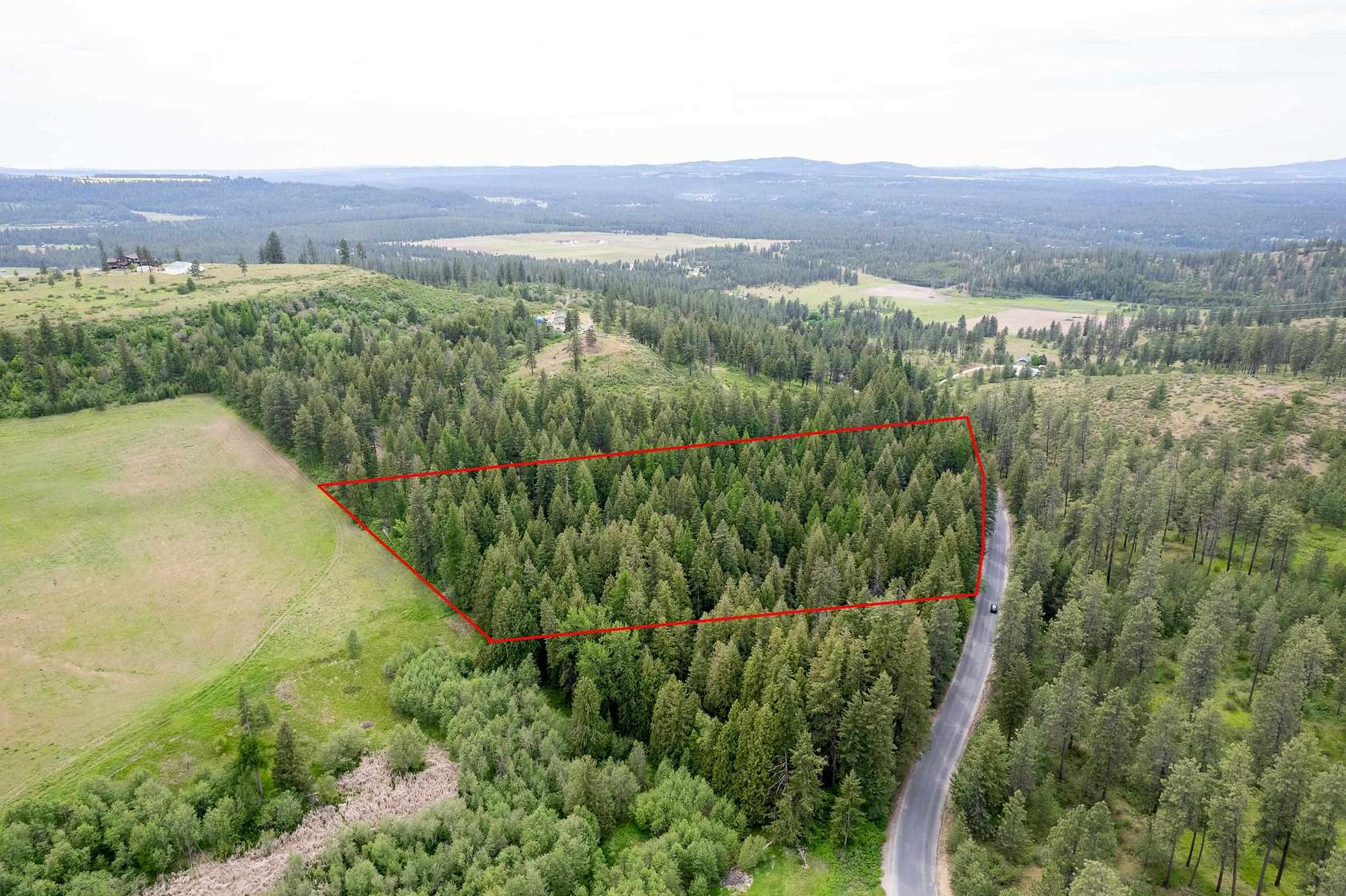 8 Acres of Land for Sale in Chattaroy, Washington