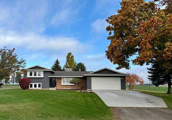 4.5 Acres of Residential Land with Home for Sale in Colbert, Washington