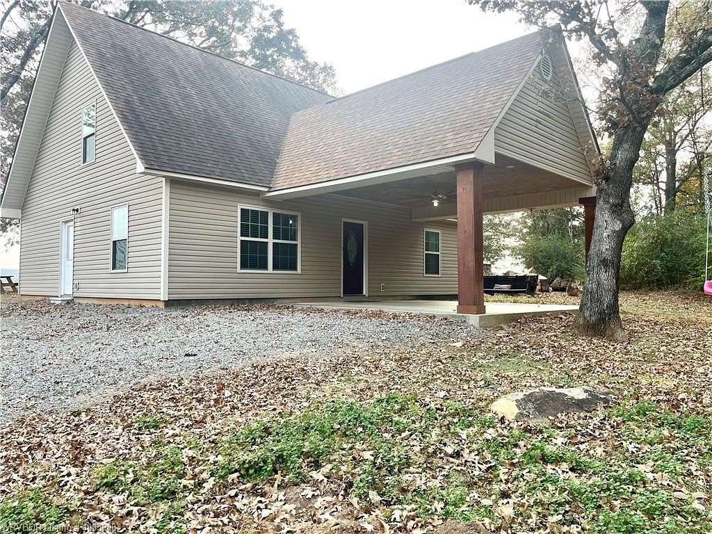 6.3 Acres of Residential Land with Home for Sale in Pocola, Oklahoma