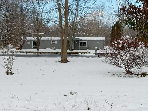 7 Acres of Residential Land with Home for Sale in Smiths Creek, Michigan