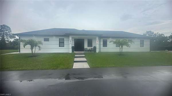 2.27 Acres of Residential Land with Home for Sale in Naples, Florida