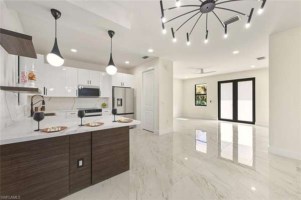 2.27 Acres of Residential Land with Home for Sale in Naples, Florida