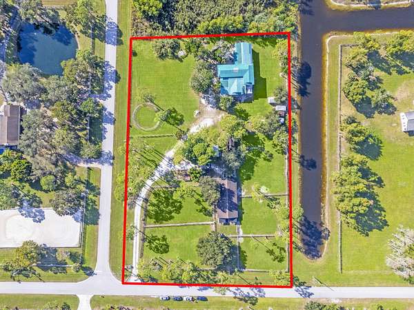 5.12 Acres of Land with Home for Sale in Lake Worth, Florida