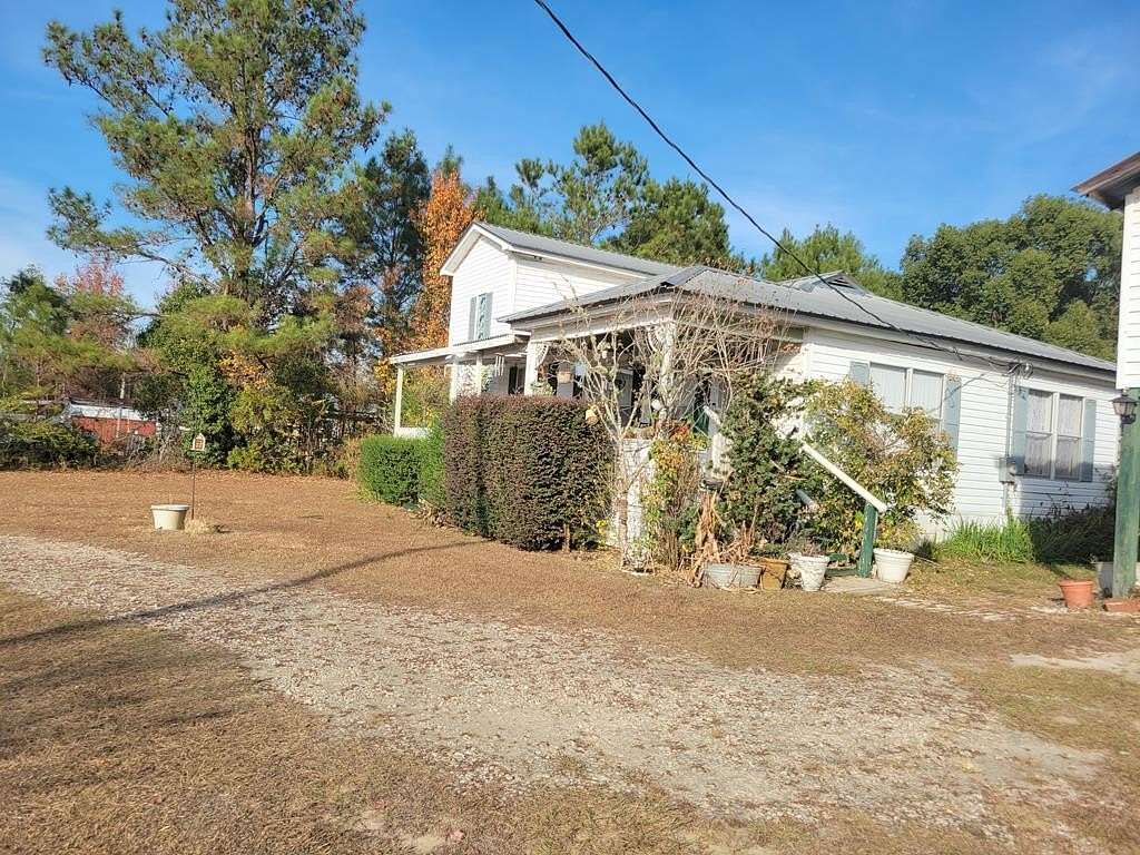 1.56 Acres of Residential Land with Home for Sale in Blountstown, Florida