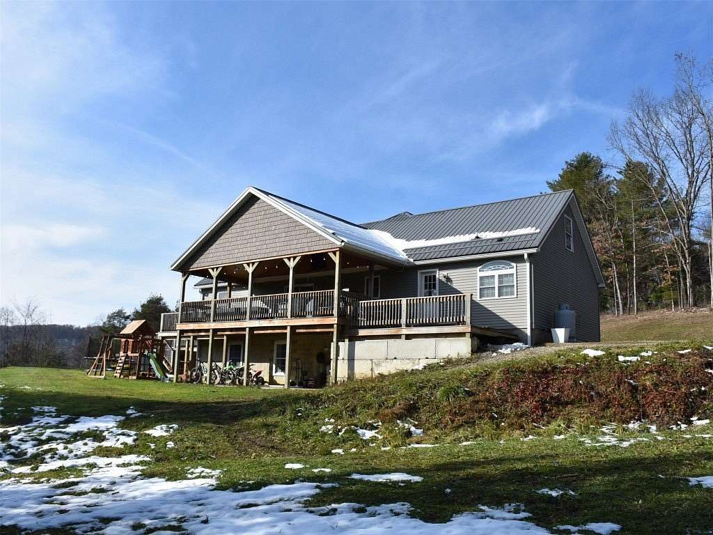 5.75 Acres of Residential Land with Home for Sale in Grand Valley, Pennsylvania