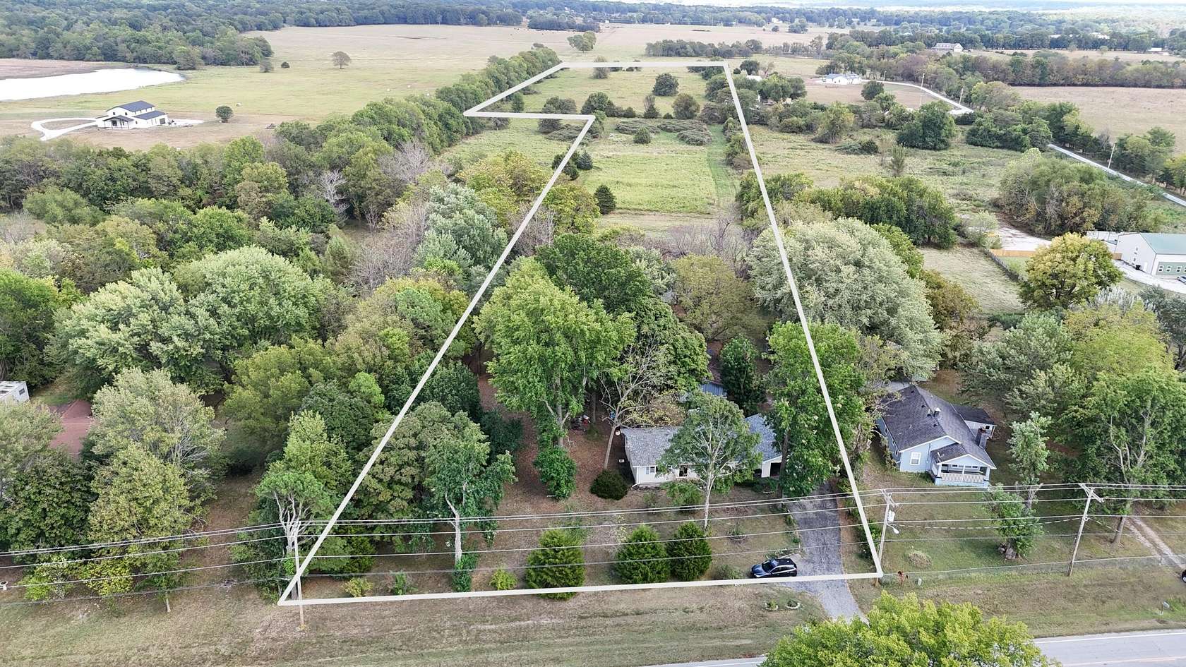 11.2 Acres of Recreational Land with Home for Sale in Springfield, Missouri