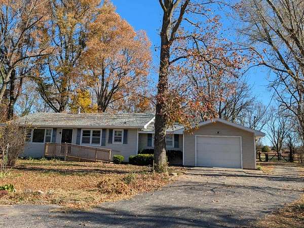 11.2 Acres of Recreational Land with Home for Sale in Springfield, Missouri