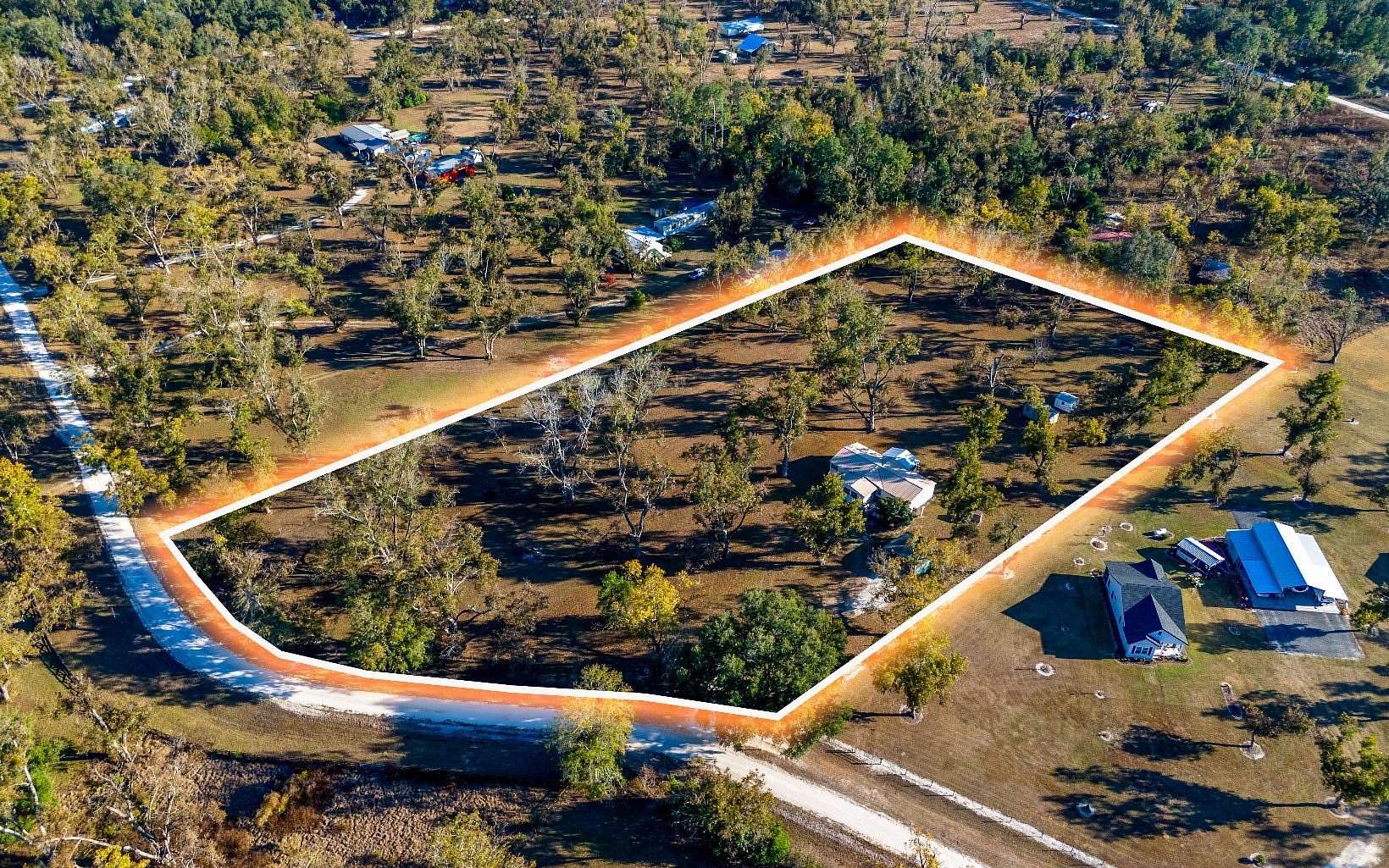 4 Acres of Residential Land with Home for Sale in Live Oak, Florida