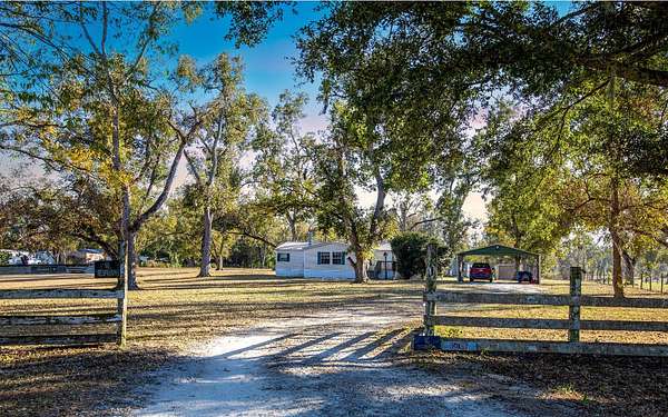 4 Acres of Residential Land with Home for Sale in Live Oak, Florida