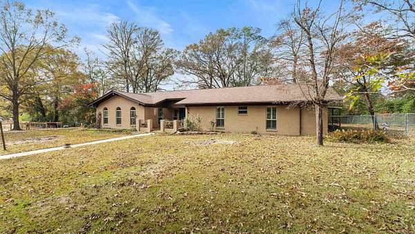 5.48 Acres of Land with Home for Sale in Atlanta, Texas