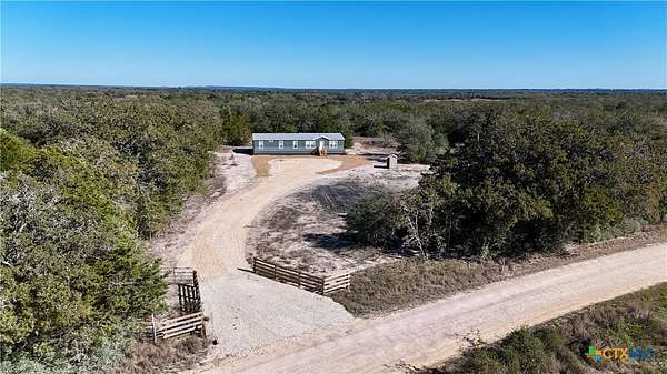 5.66 Acres of Residential Land with Home for Sale in Flatonia, Texas