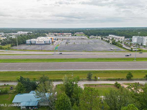 0.6 Acres of Commercial Land for Sale in D'Iberville, Mississippi