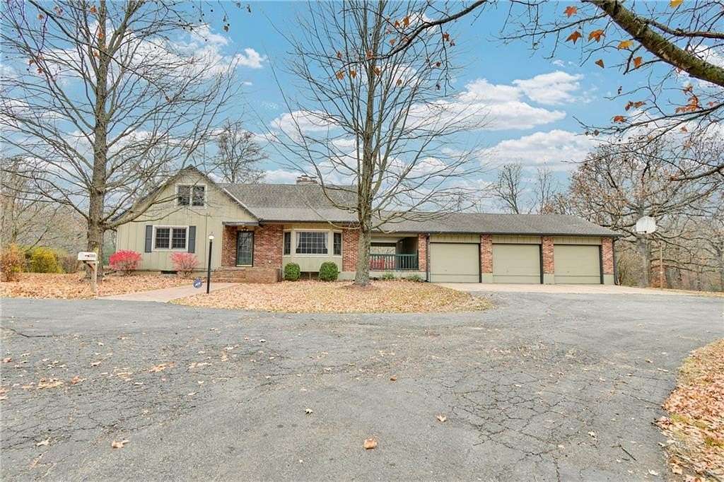 4.8 Acres of Residential Land with Home for Sale in Pleasant Hill, Missouri