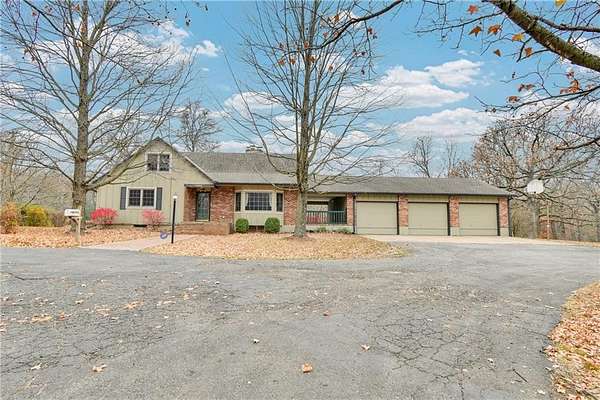 4.8 Acres of Residential Land with Home for Sale in Pleasant Hill, Missouri