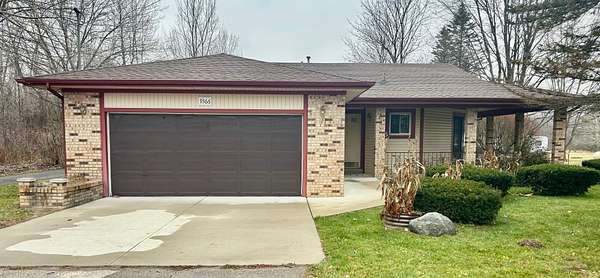 6 Acres of Residential Land with Home for Sale in Montrose, Michigan