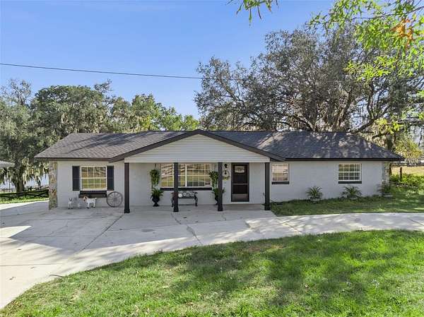 2.27 Acres of Residential Land with Home for Sale in Weirsdale, Florida