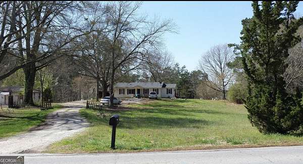 3.44 Acres of Residential Land with Home for Sale in Sugar Hill, Georgia