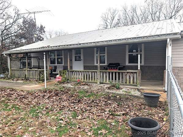 5 Acres of Residential Land with Home for Sale in Barnett, Missouri